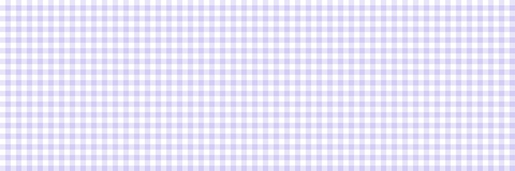 A soft pastel purple and white gingham pattern. Seamless light lilac plaid background for textile, fabric, tablecloth, or vintage scrapbook paper design.
