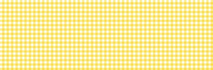 Yellow and white gingham plaid pattern, ideal for spring and summer textiles, picnics, clothing, or backgrounds. Yellow classic checkered design perfect for seasonal graphic design projects.