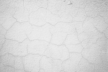 cracked concrete on white wall texture background