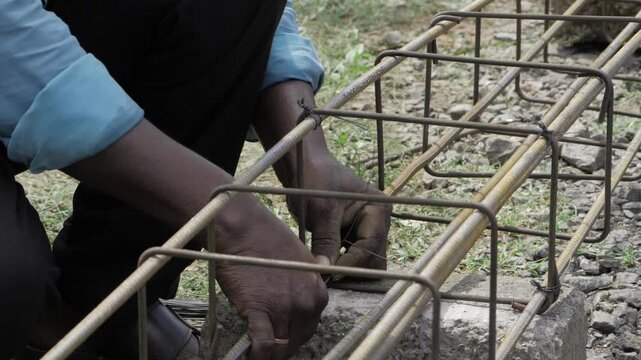Hands at Work - Metal Framework Construction