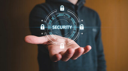 Person presenting security concept with digital locks and circles on outstretched hand in front of brown background
