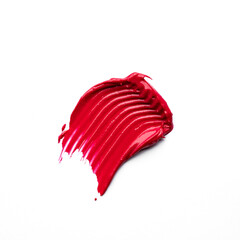 Red lipstick swatch texture isolated on white background. Cosmetic product smear smudge swatch