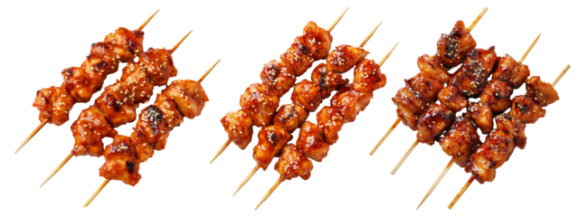 Grilled Korean Dakkochi chicken skewers coated in glossy sesame glaze,isolated on white background, Asian cuisine