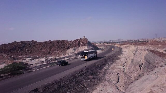 Cinematic 180-Degree Drone Shot Over Winding Makran Coastal Highway, Buzi Pass, Balochistan, Pakistan