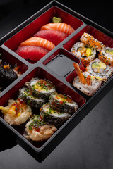Japanese style bento box with nigiri and sushi