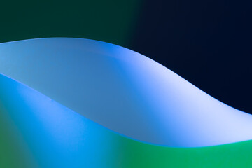 Abstract background showing curved lines creating dynamic shapes and shadows