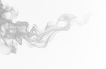Soft gray smoke plume drifts in natural flowing shapes with subtle wisps and smooth light diffusion. Neutral haze enhances cinematic feel. Gray smoke transparent PNG.