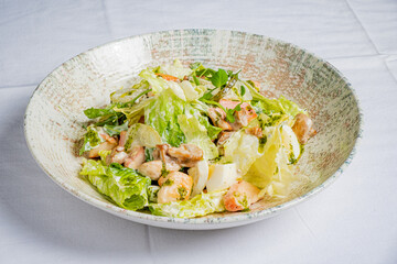 Crisp greens and colorful ingredients create a delightful salad that looks appetizing and fresh