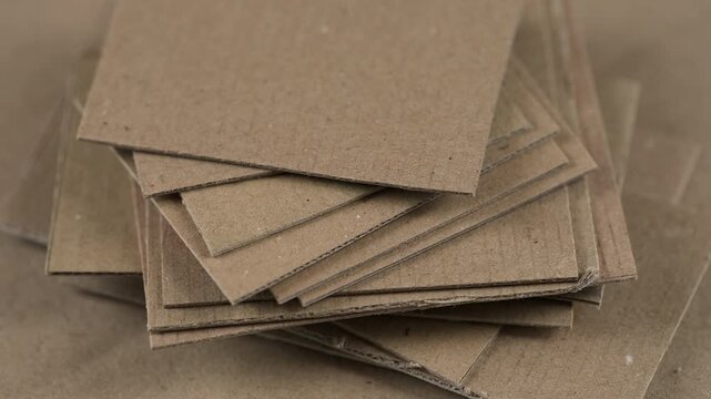 Close-up of stack of brown cardboard pieces