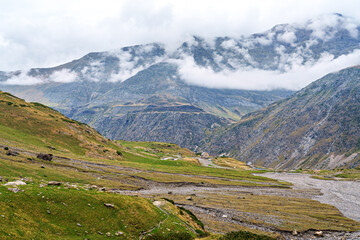 Hiking trail in Cirque de Troumouse at Heas in the Hautes-Pyrenees department in France, forming the border with Spain