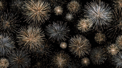 Fototapeta premium Vibrant golden and silver fireworks bursting vividly in a dark night sky creating a festive and celebratory atmosphere for special events and holidays
