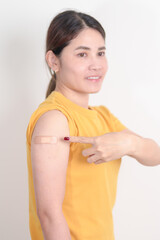 Adult Woman with bandage after received vaccine. Vaccination and Immunization for Influenza, HPV, Zoster, IPD, DTP or Diphtheria, Tetanus and Pertussis, MMR, Hepatitis B, Covid and Varicella vaccine