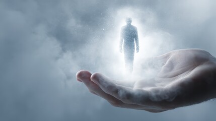 Human silhouette glowing with light and energy held in an open palm