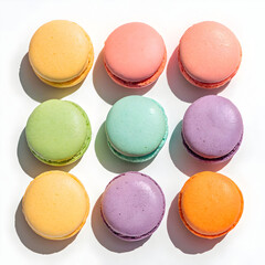 a close-up top-down view of six colorful macarons