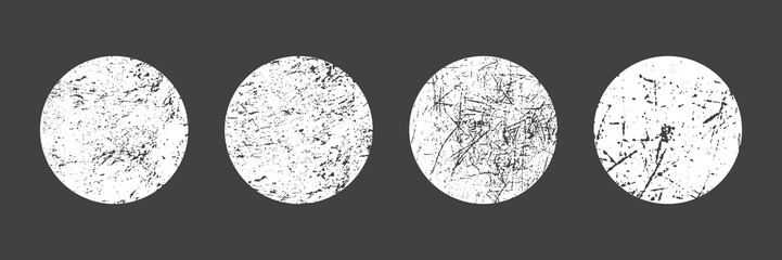Grunge texture circles set. Collection of distressed round overlays with scratched, dirty, and splattered effects for retro photo or background use. Vector illustration.