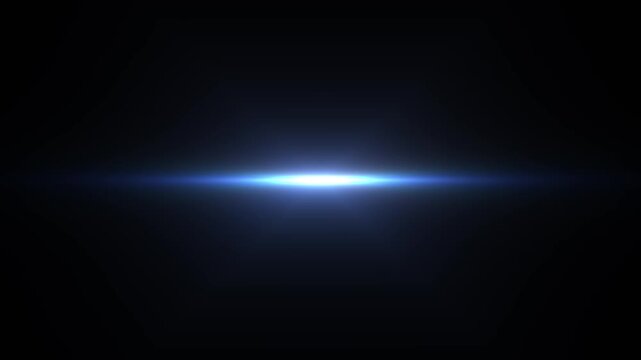 blue flare on laser flash on black background	
