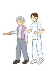 高齢者の歩行訓練をサポートする介護スタッフ