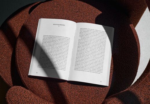Mockup Of Hardback Book With Customizable Pages On Chair