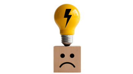 A bright yellow light bulb with a black lightning bolt symbol representing an idea sits atop a small wooden block with a sad face drawing isolated on transparent background