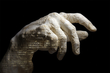 Ancient hand sculpture with digital binary code overlay on black background