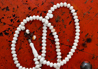 close up of rosary beads, religion theme and concept