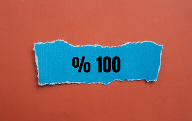 One hundred percent message written on ripped torn paper background. Conceptual One hundred percent symbol. Copy space.