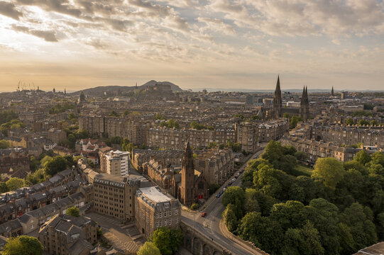Aerial view of the spires of St. Mary's Episcopal Cathedral pierce the skyline amidst a tapestry of historic buildings and verdant trees, Moray Feu, Scotland, United Kingdom.