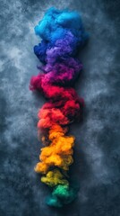 A colorful smoke trail is shown in the image, with the colors ranging from blue to red. The smoke appears to be coming from a fire, and it is spread out in a long, thin line