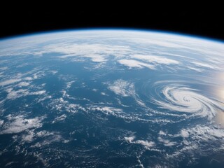 A large hurricane swirling over the ocean from a satellite view in space with clouds and blue waters