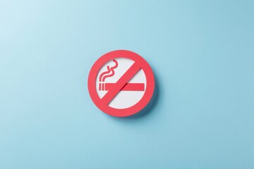No smoking sign against light blue background promoting smoke-free environment