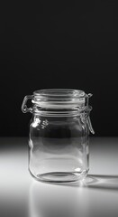 Clear, empty glass storage jar with a closed metal lid, resting on a bright surface, emphasizing transparency and freshness ,Kitchen ,Ingredient ,Empty