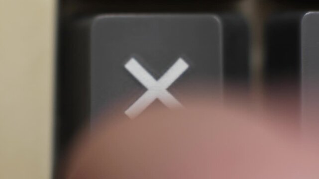 Macro close up of a multiply key being pressed, symbolizing scaling and compound growth