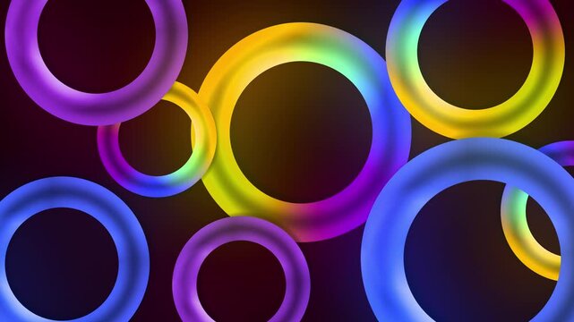 Floating circular multicolour glowing neon 3D torus loop rings on a dark gradient background creating vivid visual shapes vibrant abstract elements dynamic motion graphic animations purple blue yellow