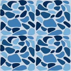 A graphic terrazzo tile in varying shades of navy blue background. Classic Italian floor texture in modern interiors style.