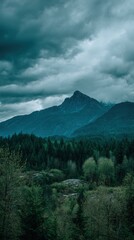Dramatic Stormy Clouds Over Majestic Mountain Peak and Forest.