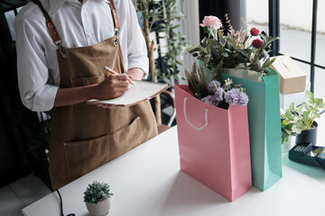 startup SME owner markets small plants for green living and environmental promotion