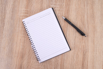 Ready to Capture Brilliant Ideas Clean Spiral Notebook and Black Pen