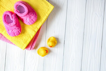 baby accessories for bath on wooden background