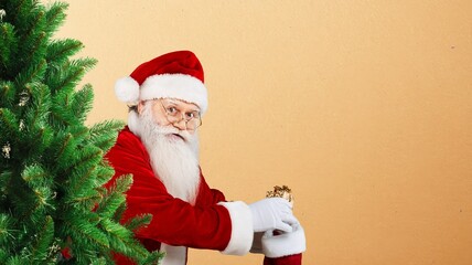 Happy old Santa Claus with red costume