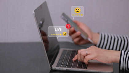 Happy women at women owned ecommerce business working on live stream for online shopping with good rating