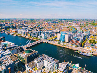 Aerial of Dublin City, Ireland, with Liffey River and Samuel Beckett Bridge