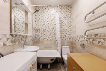 modern bathroom room with toilet and washing machine