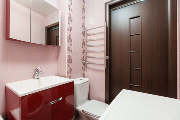 modern bathroom room with toilet and washing machine