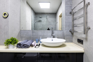 modern bathroom room with toilet and washing machine