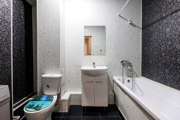 modern bathroom room with toilet and washing machine
