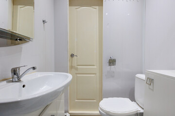 modern bathroom room with toilet and washing machine
