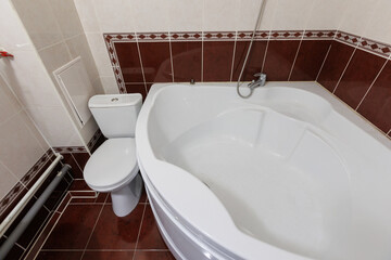 modern bathroom room with toilet and washing machine