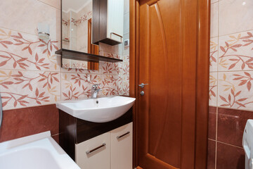 modern bathroom room with toilet and washing machine