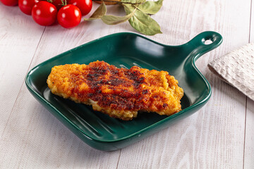 Roasted breaded crispy pork schnitzel