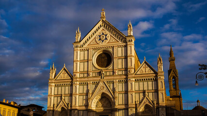 'Santa Croce' (Holy Cross) 19th century marbles facade turn gold at sunset, in Florence historical center